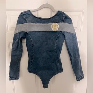 True Religion Manchester United long sleeve jean body suit. Never worn.